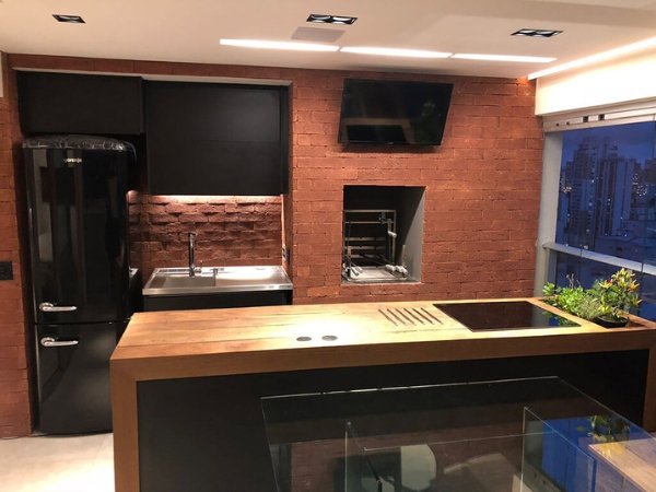 cozinha com parede de tijolinho